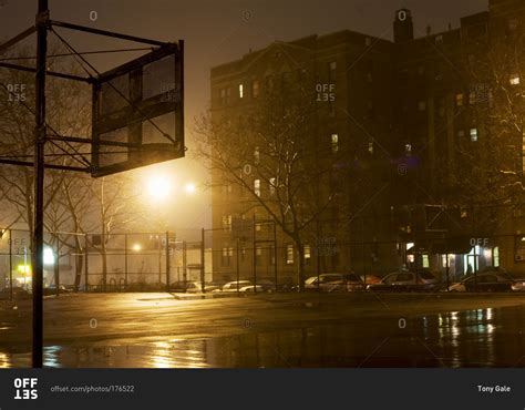 City basketball court at night stock photo - OFFSET