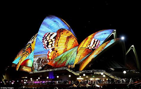 Lighting up the sails: Sydney's iconic Opera House glows with grandeur designs on opening night ...