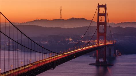 a sunset shot taken with golden gate bridge as the focal point, golden gate bridge sunset 4k HD ...