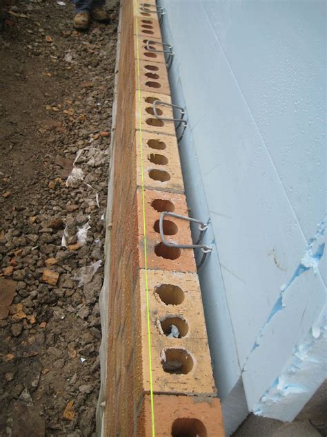 How to Install a Brick Veneer on an Exterior Wall