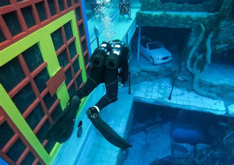 [PHOTOS] Dubai Unveils The World's Deepest Swimming Pool Which Features A Sunken City