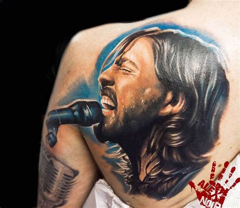 Dave Grohl Tattoos - Dave Grohl Ditches His Shirt To Show Off Muscular Bod Daily Mail Online ...