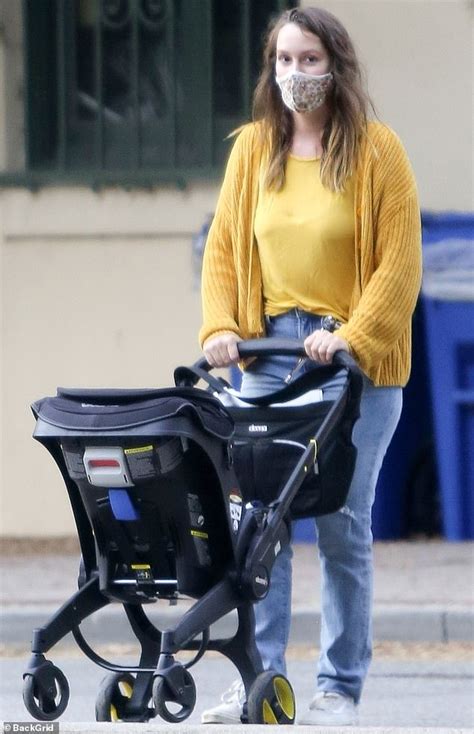 Leighton Meester teaches her daughter Arlo to ride a bike during day at the park with family ...