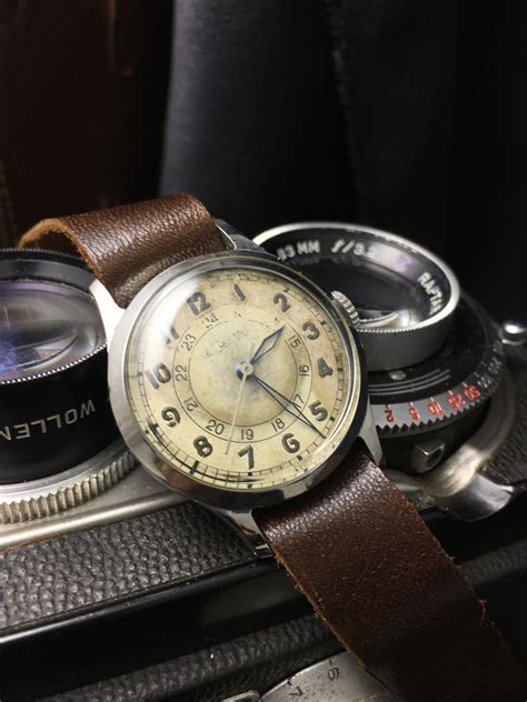 1950's Military Style Universal Steel — Cool Vintage Watches | Vintage watches, Leather straps ...