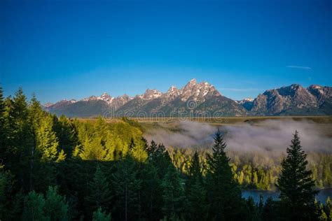 Grand Teton at sunrise stock photo. Image of jackson - 157257818