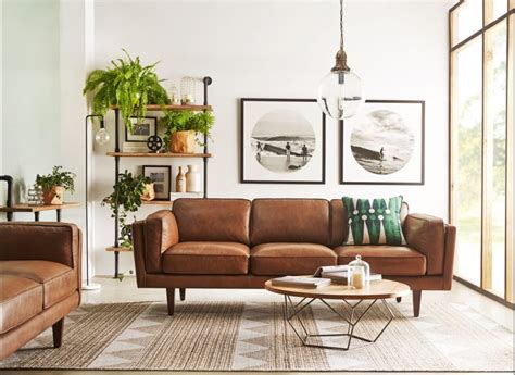 brown leather sofa black and white photos mid century modern living room chairs | Interior ...