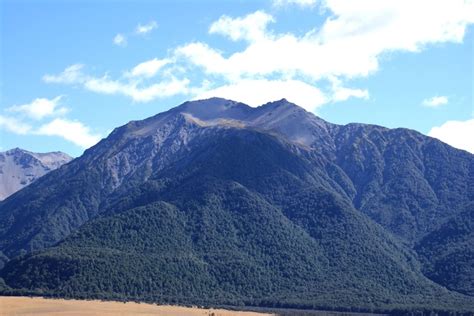 Arthur's Pass, previously called Camping Flat then Bealey Flats, and for some time officially ...