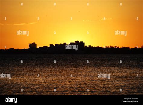 Miami cityscape skyline at dawn sunrise with dark clouds, Florida, USA Stock Photo - Alamy