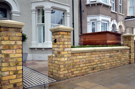 Brick garden wall Imperial Yellow stock cap coping bespoke storage London Clapham Balham ...