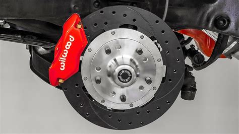 Does disc brake caliper mounting location on the rotor matter?