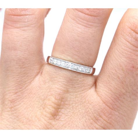 half eternity diamond ring set in 9ct white gold