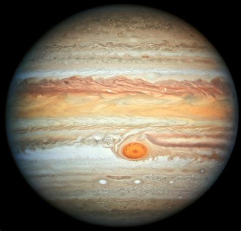 Clouds on Jupiter rising up above the surrounding atmosphere