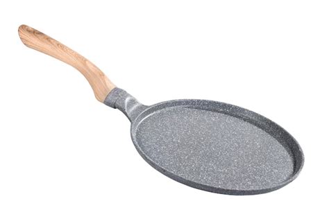 Premium Photo | Empty cast iron pancake frying pan isolated on white