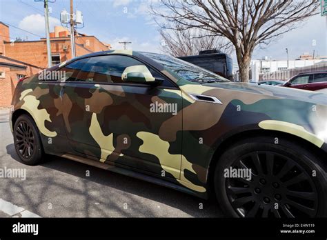 Car with military camouflage pattern wrap - USA Stock Photo: 79840245 - Alamy