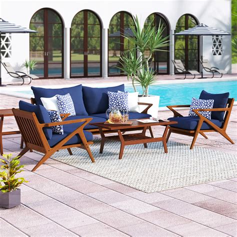 scandinavian outdoor furniture set with blue cushions solid wood frames mid-century modern patio ...