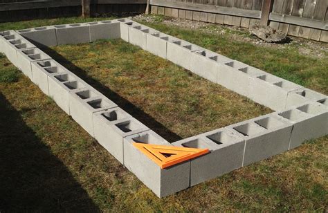 How To Build A Cinder Block Raised Garden Bed | Cinder block garden, Building a raised garden ...