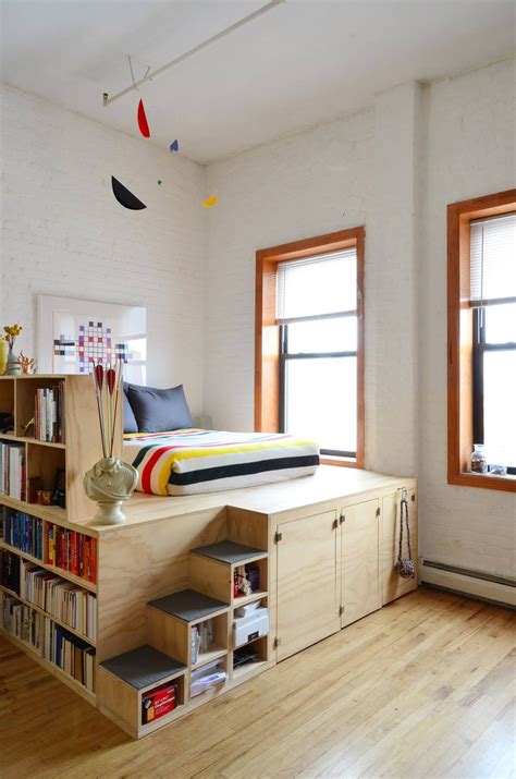 An Elevated Bed with Shelving and Storage — Homebnc