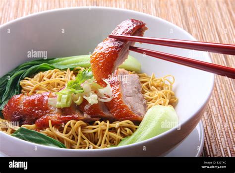 Chinese Peking Duck meat noodle soup Stock Photo - Alamy