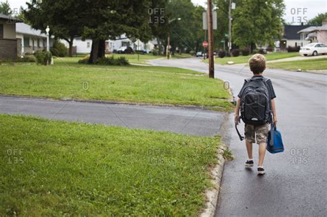 Boy Walking To School