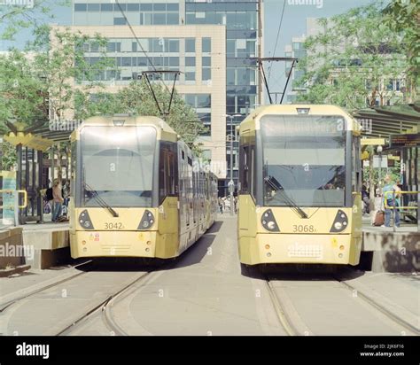 Manchester, UK - June 2022: Two Manchester Metro trams at St Peter's square tram stop Stock ...