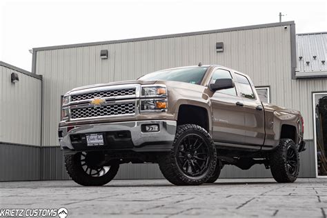 Lifted 2014 Chevy Silverado 1500 with 7 Inch Rough Country Suspension Lift Kit and 22×10 Fuel ...