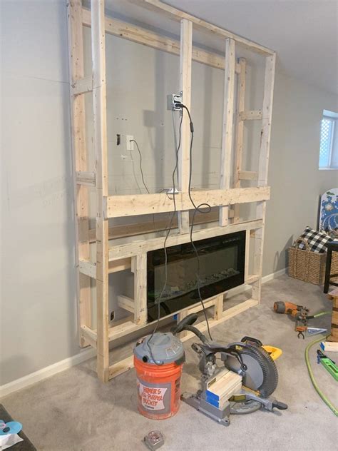 Diy basement fireplace with modern blaze s recessed electric fireplace – Artofit