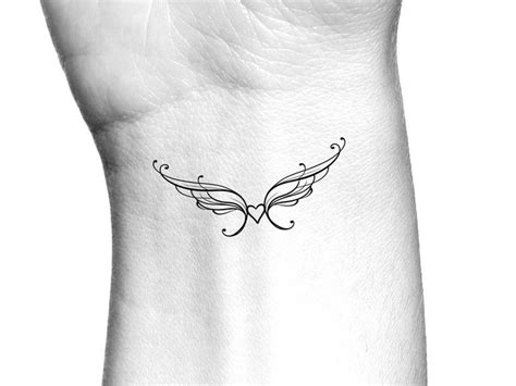 Heart Angel Wings Temporary Tattoo - Etsy | Angel wing wrist tattoo, Tattoos for women, Small ...