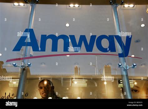 Amway direct selling company logo on its store window in Southampton Row, London, England Stock ...