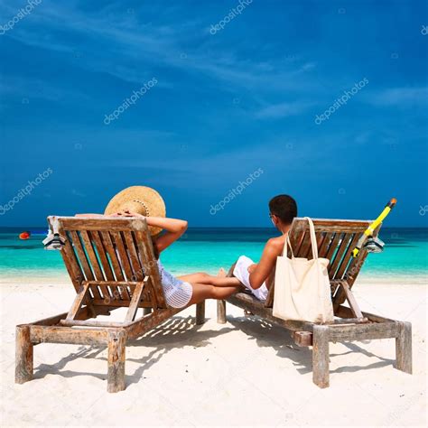 Couple on beach at Maldives Stock Photo by ©haveseen 62358889