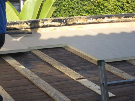 Flat Roof Insulation with Rigid Foam Board How To