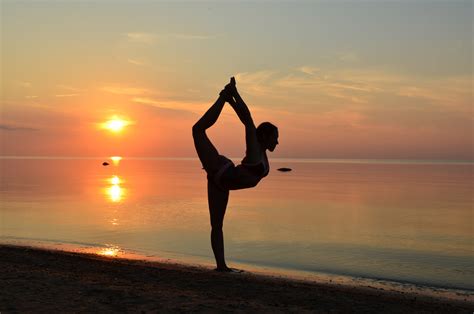 Browse Free HD Images of Beach Yoga Pose- In Sand At Sunset