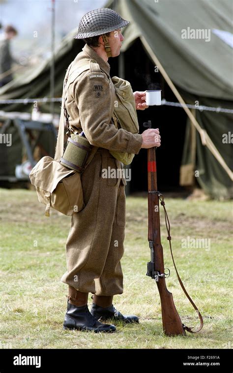 A re-enactor dressed in the uniform of a WW2 British Army Home Guard Soldier Stock Photo - Alamy