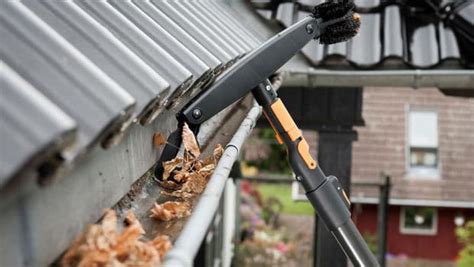 How to Clean a Roof Gutter - Mr. Roof