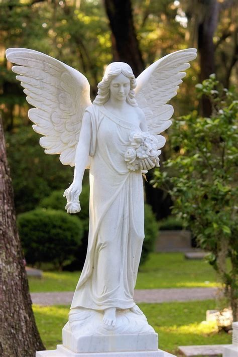 Royalty-Free photo: Female angel statue in garden | PickPik