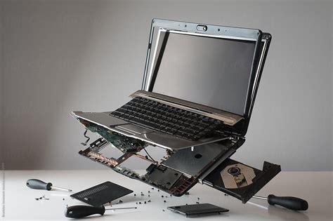 "Broken Laptop Computer Floating" by Stocksy Contributor "B Krokodil" - Stocksy