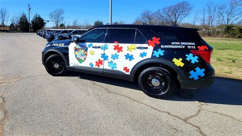 Jenks police unveil autism awareness patrol car | KTUL