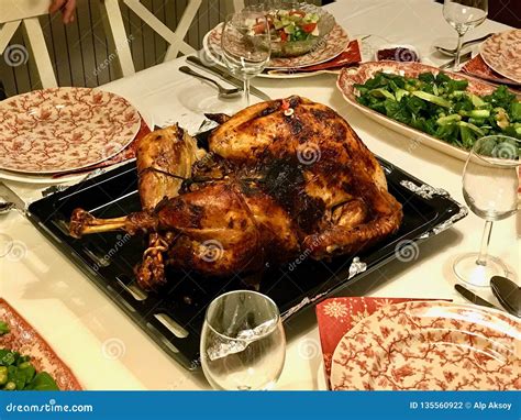 Homemade Roasted Thanksgiving Day Turkey with All the Sides at Dinner Table. Stock Photo - Image ...