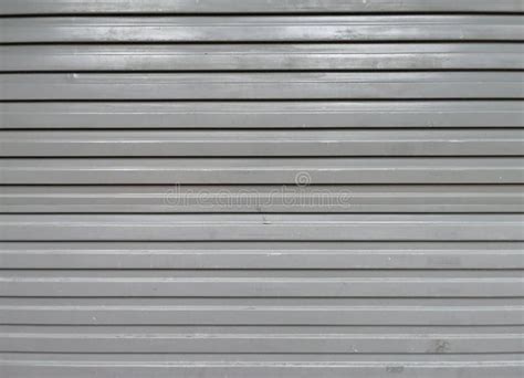 Perforated Metal Garage Door Texture Background. Copy Space Stock Photo - Image of empty, locked ...