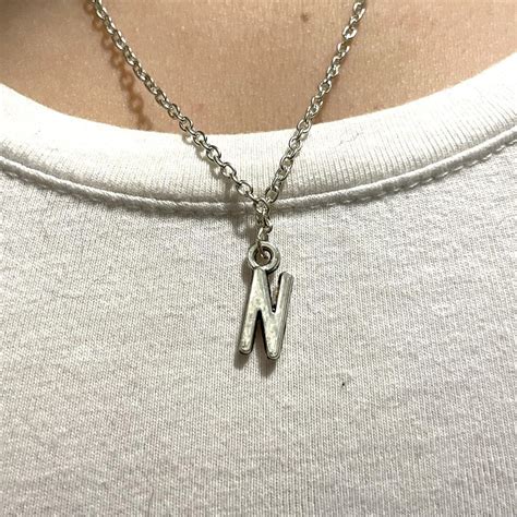 Silver Alphabet Necklace Buy it for yourself or... - Depop