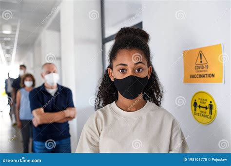 Portrait of Girl with Face Mask, Coronavirus, Covid-19 and Vaccination Concept. Stock Image ...