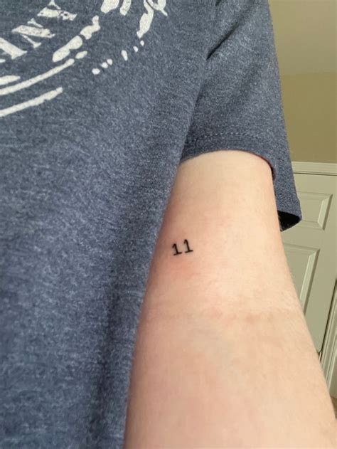 11 tattoo | Number tattoos, Small wrist tattoos, Wrist tattoos