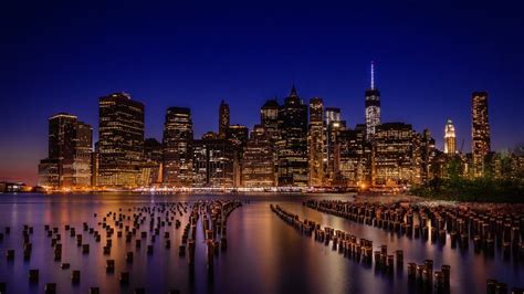 Brooklyn Bridge Park with Manhattan skyline during night, New York City, USA ...