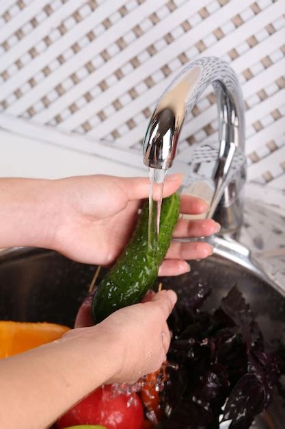 Premium Photo | Washing vegetables closeup