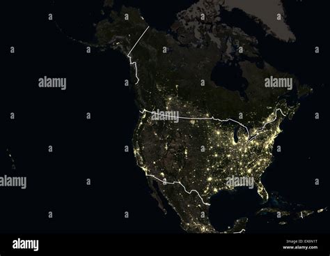 North America at night in 2012, showing the United States and Canada. This satellite image with ...