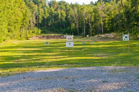 Outdoor shooting range with targets at different distances. — Stock Photo © volgariver #28293767