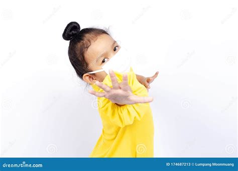 Cute Asian Kids Girl Portrait Wearing Mask for Protect COVID 19 and Show Stop Hands for Break ...