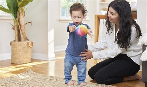 6 ways to help toddlers throw and roll balls | Lovevery