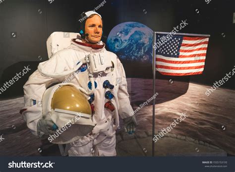 Neil Armstrong On The Moon Holding Flag