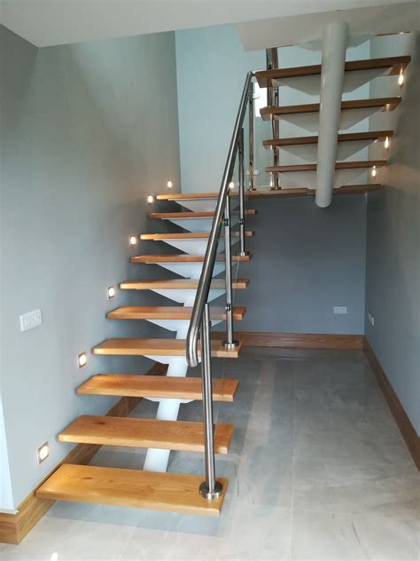 Stairs with Stainless Steel Handrail – E3D Steel Design Ltd.