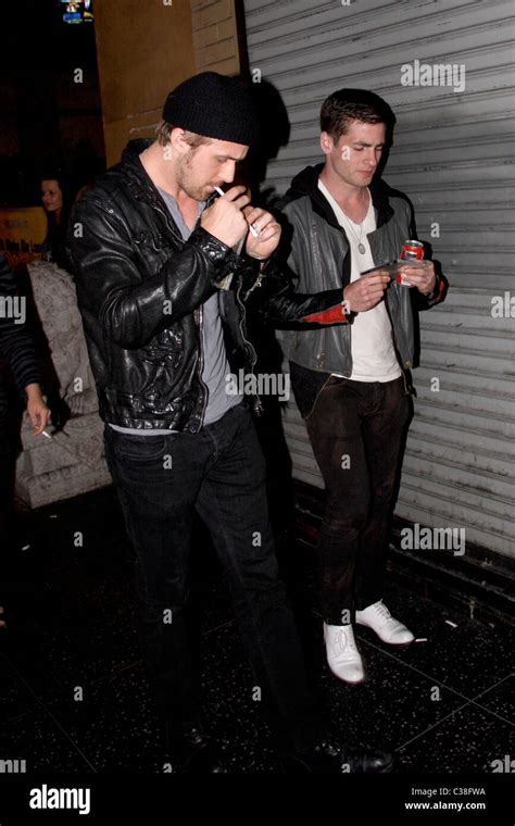 Ryan Gosling lights up a cigarette outside the Egyptian Theater after attending the premiere of ...